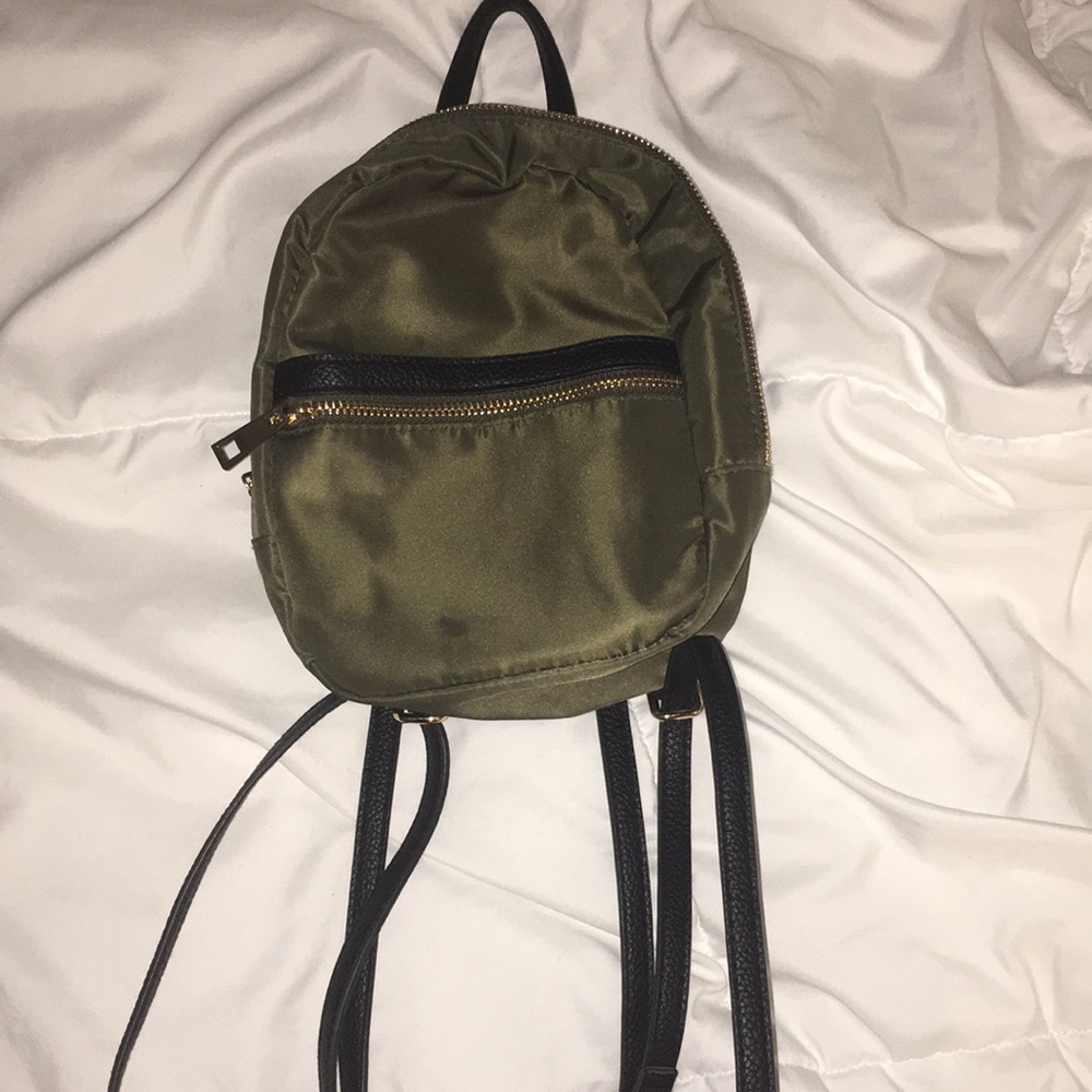 a•n•d small olive green mini bag